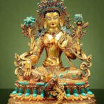 Gilded copper Green Tara statue with gem inlay